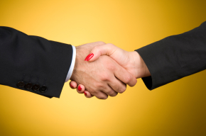 man woman handshake shake hands iStock_000010387373Small