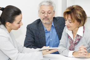 Couple meeting with investment advisor.