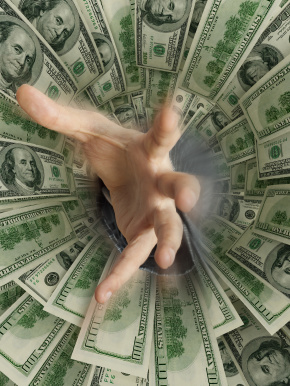 hand drowning in money hole