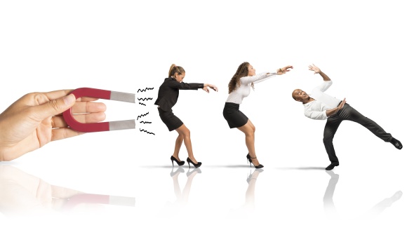 Magnet drawing in three people