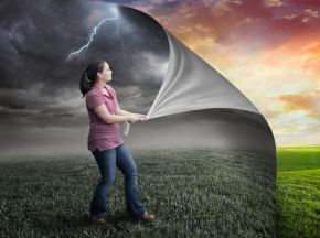 Woman pulls pack storm page and reveals sunset.