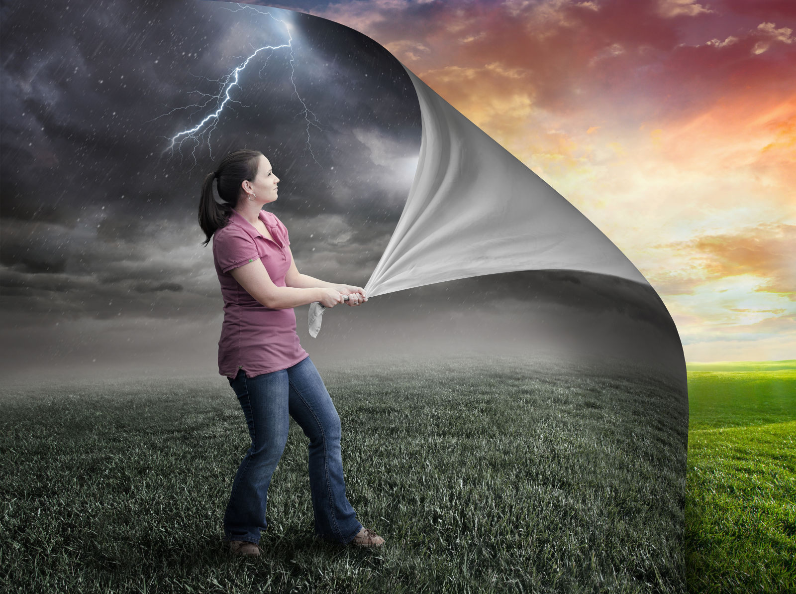 Woman pulls pack storm page and reveals sunset.