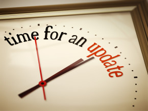 Words "time for an update" on clock face