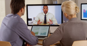 Three people speaking by videoconference