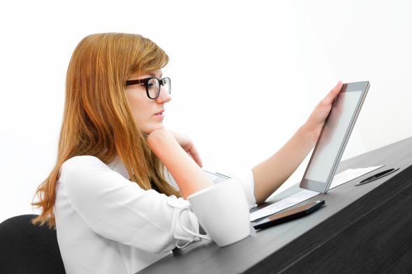 Young businesswoman using a tablet