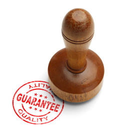 Red "quality guarantee" stamp with wooden stamper