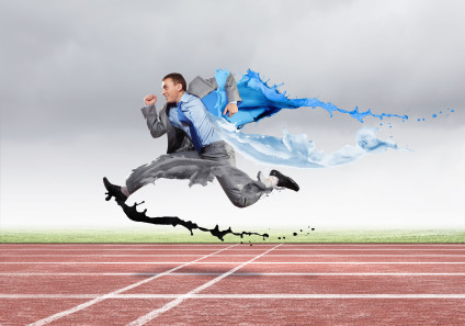 Stylized photo of businessman running on a track