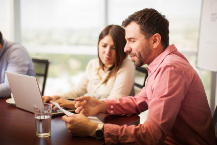 Colleagues working side by side