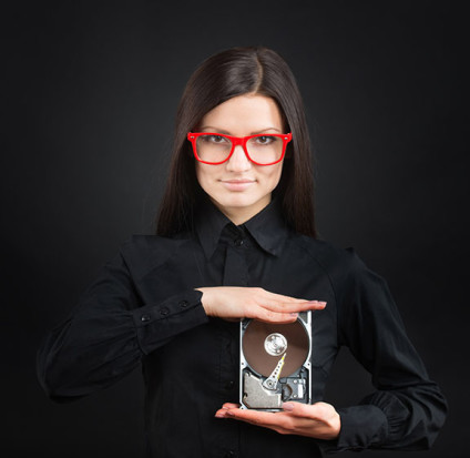 Woman holding a hard drive