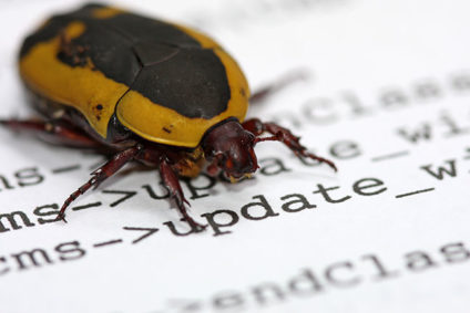 Beetle crawling toward the word "update"