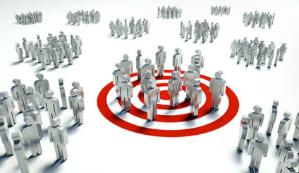 Group of figures stands on target symbol while other groups stand elsewhere