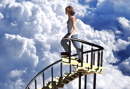 Woman ascending staircase into clouds