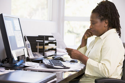 Black woman working at desk
