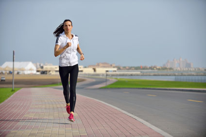 Woman outside jogging in morning
