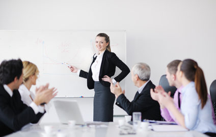 Businesswoman giving presentation at meeting