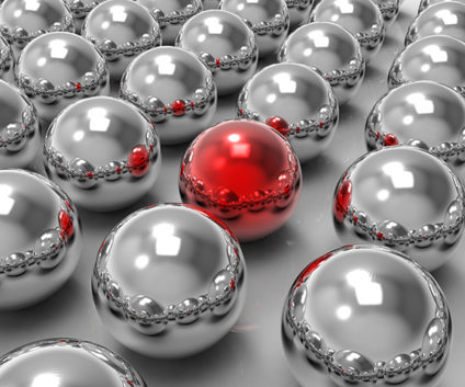 Red sphere among silver spheres