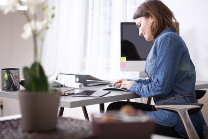 Young woman working at desk