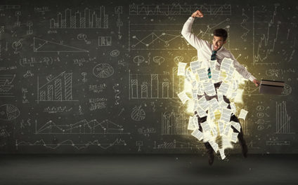 Businessman jumping with papers stuck to him