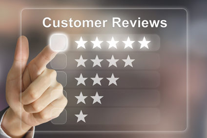 Hand clicking customer review stars on virtual screen interface
