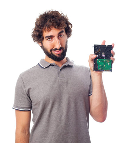 Man holding up a hard disk