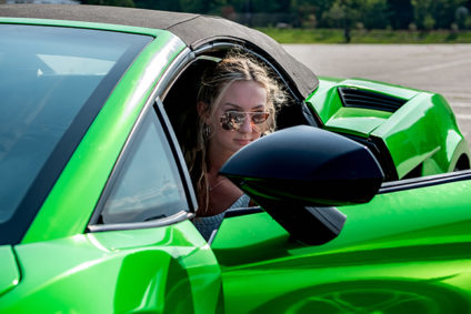 Woman driving a sports car